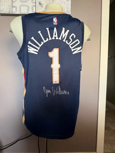 As above this Nike swingman jersey is hand signed by Zion Williamson. This jersey is new and comes w...