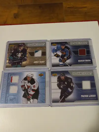 For sale. Hockey Cards Upper Deck Game Used jersey cards Perry,Parise Lt 4. Cards are in near mint c...