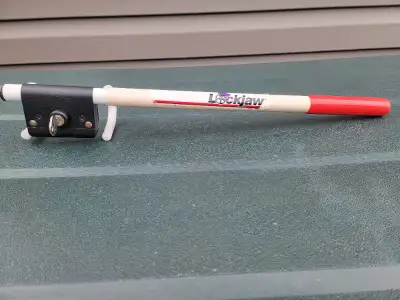Lockjaw steering wheel lock bar, asking $15.00 if you are reading this ad it's available.