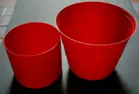 2 red plastic flower pot holders/planters  9 & 6.5-in wide 2/$10