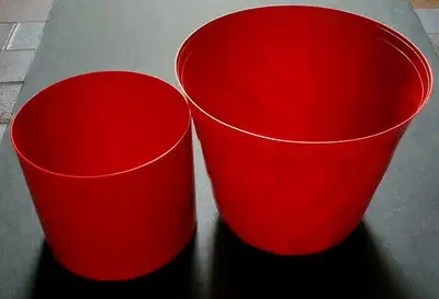 2 red plastic flower pot holders/planters  9 & 6.5-in wide 2/$10, View more