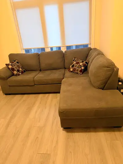 L-shape grey sectional from brick