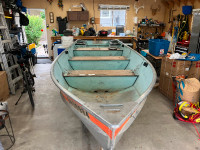 14 foot Lund fishing boat and Calkins trailer