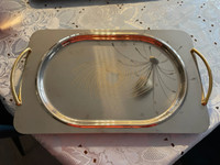 Stainless steel serving tray with gold trim