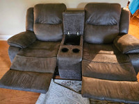 Grey couch and loveseat that recline