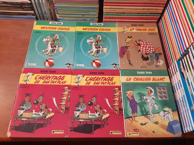 Lucky Luke Bandes dessinées BD Lot de 17 bd abîmées 2$ et + dans Bandes dessinées  à Laurentides - Image 3