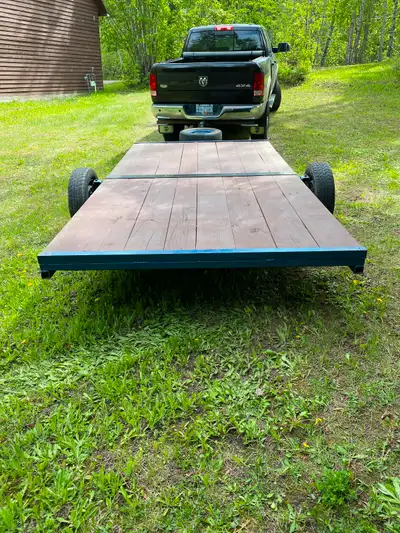 ubuilt trailor 6 feet wide 12 feet long 2" ball hitch and 14"tires and rims new wood deck asking $13...