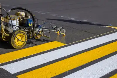 Offering line painting services for parking lots, roadways, and other surfaces. As seen in the photo...