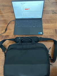 Dell Vostro 3520 15.6" laptop with bag/case and power adapter