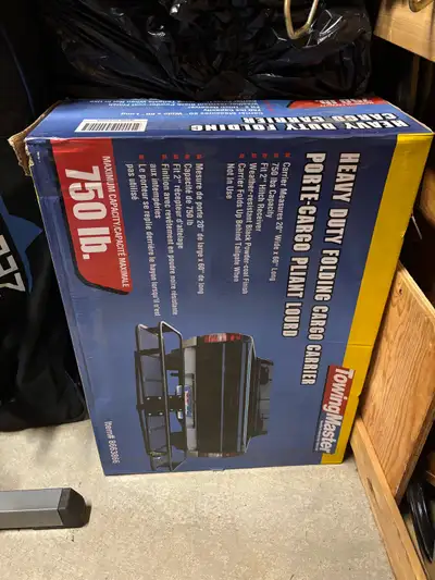 Heavy duty folding cargo carrier. 750lb capacity. Fits a 2” hitch. Brand New in box. Never opened or...