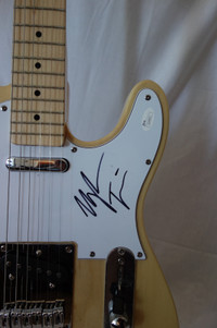Meghan Trainor Signed Electric Guitar.