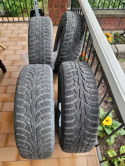 Set of 4 used tires - 1 maybe defective - winter tires Asking $120 for the set