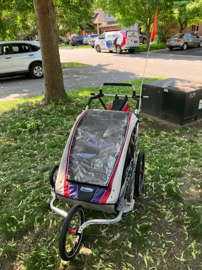 I'm selling a used Chariot CX2 double child carrier, a versatile and sturdy stroller and bike traile...