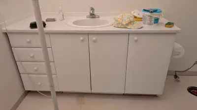 Renovation sale-Complete bathroom vanity including vanity top, cabinets, sink, faucet and mirror. St...