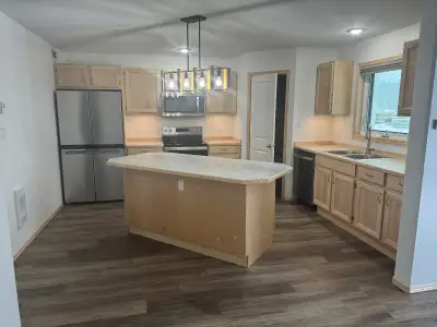 2 bedroom ground level apartment in Whistle Bend. Energy efficient unit with a heat plump. Separate...