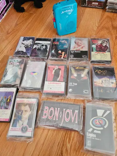 Portable cassette player and tape lot, View more