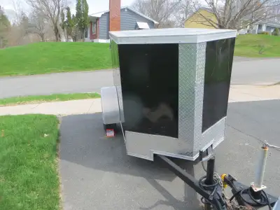 2016 4X6 ft Enclosed Cargo Trailer; Good Condition. Great for pulling behind a car.; 15500km on trai...