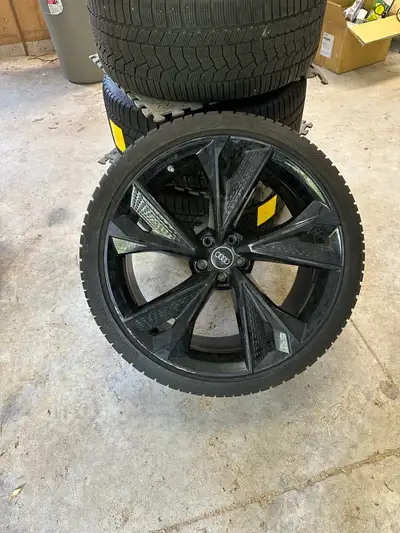 Factory 22 inch Audi (not reps) rims with winter tires. Used for 2 seasons then traded car. Date on...