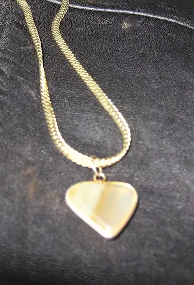 Polished  Honey Onyx Heart from Panama with 18 inch chain New, View more