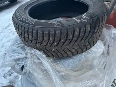 3 studded winter tires, studs are worn but tread is great! 205 55 16.