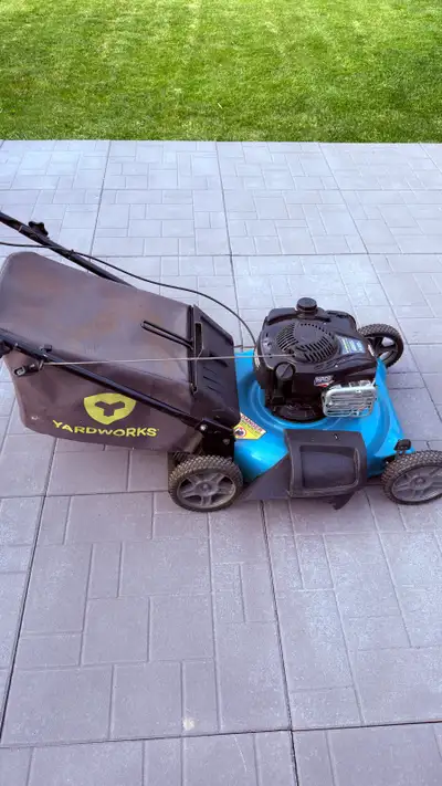 Yard work gas lawn mower for sale uses for 1/12 season selling cause I got a battery operated lawn m...