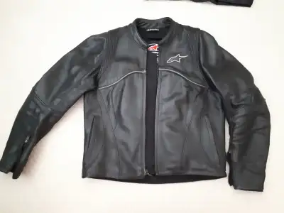 BRAND NEW men’s medium perforated leather motorcycle jacket. Relaxed fit, removable liner. $500