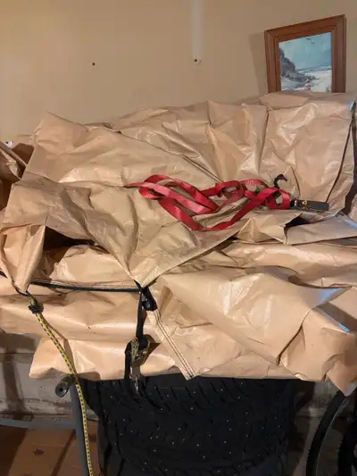 Beige auto canopy 12x20x8. Used 1 season , good shape .small holes in corner for bungee cords. Lake...