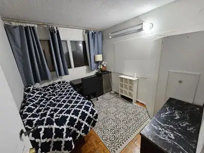 A spacious, fully furnished private bedroom is available for rent in a shared apartment near Eglinto...