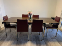 Laminate finishing/steel extendable table set (6 chairs)