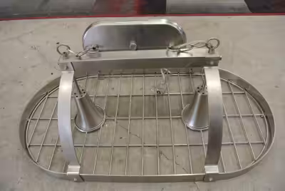 Doing double duty as a source of light and an organizing solution, this kitchen pot rack features tw...