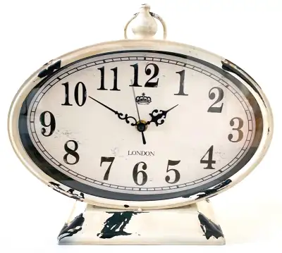 Collection. Décoration. Horloge de table en fer peint patiné, View more