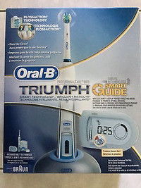 Oral B Triumph power toothbrush NEW