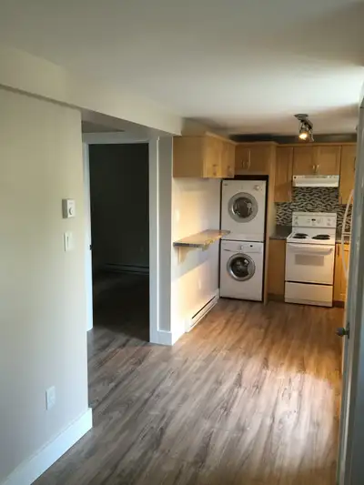 This is a two bedroom or one bedroom with a den apartment