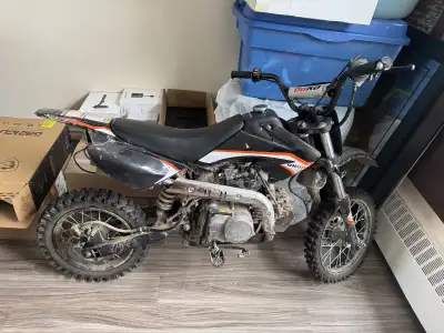GIO GX110 DIRT BIKE, everything works good . My brother is outgrowing it . It’s just covered in the...