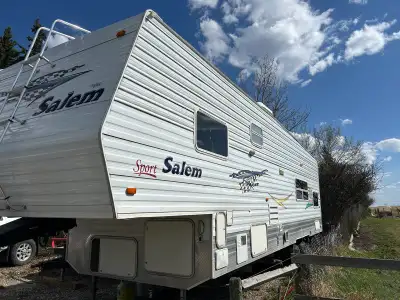 2005 Forest River 32ft toy hauler. 4000w on an generator, 240watt solar panel, brand new fridge. We...
