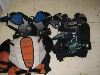 CALL 905 718 2196 no emails / no text pick up in NEWCASTLE USED 4 OLDER SETS of kid's shoulder pads...