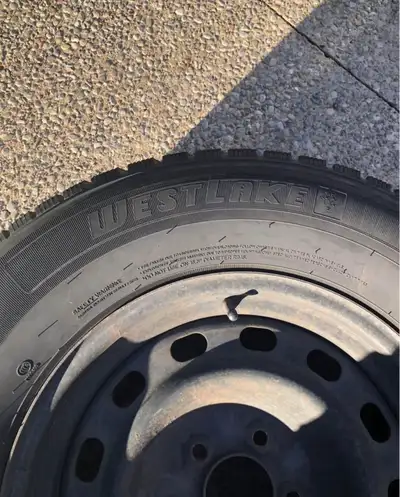 Set of 4 Westlake winter tires mounted on steel rims, originally from a Ford Explorer. Tire brand: W...