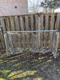 Solid soccer practice net with steel bar