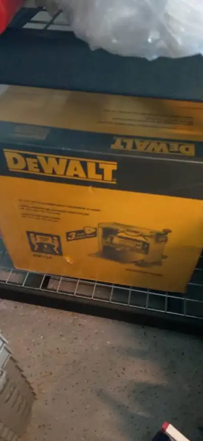 Dewalt 12 1/2" Portable Thickness Planer. Model DW734. New sealed in box in wrap. $600. Cash only. P...