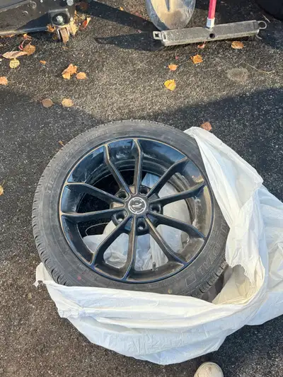 All season tires with rims! Uniroyal all season tires including black Platinum Wheels 17 inch rims....