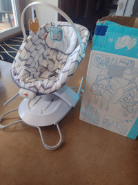 Baby Rocker Chair with bi-directional glider base.