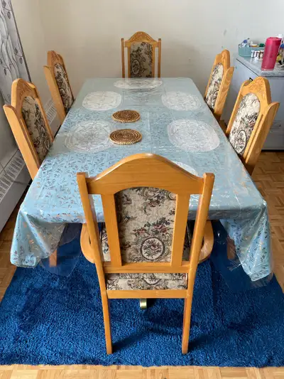 I am selling 6 dining chairs in excellent condition. Solid wood frame and cloth cushions. Barely use...