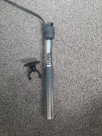 Selling a Fluval 100W aquarium heater, suitable for tanks up to 20 gallons. The heater is in good wo...