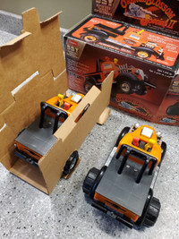 TWO 1984 ORANGE BLOSSOM SPECIAL VINTAGE TOY PULL TRUCKS