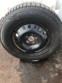 225/65/17 winter tires on rims Like New