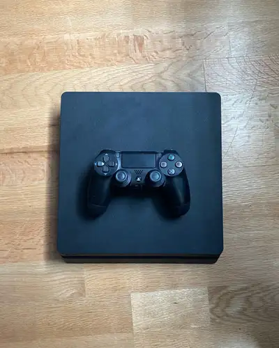 Sony PlayStation 4 console, in excellent condition and ready to play. • PlayStation 4 Console (500GB...