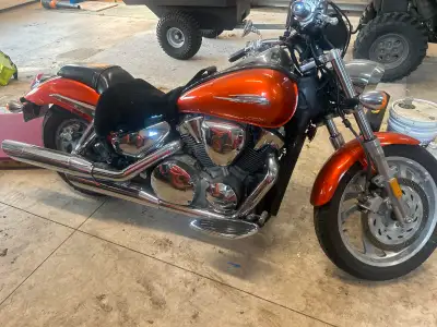I'm selling a used motorcycle, perfect for cruising around town. It comes with some aftermarket acce...
