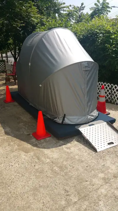 Portable motorcycle garage, waterproof, wind proof. New in box.