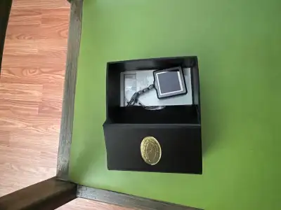 Tao Digital photo keychain, brand new, never used. Nice , sturdy gun metal look, could make a nice p...