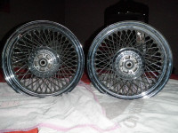 New 80 spoke chrome Harley wheels.